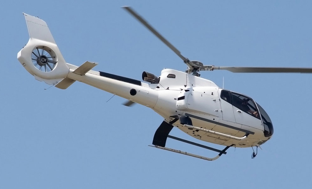 Airbus EC130 B4 flying in the sky