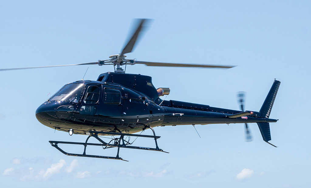 Black Airbus H125 Flying in the sky