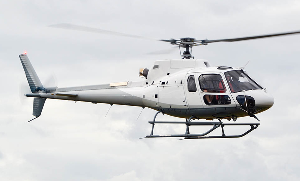 Airbus AS350 B3 flying in the sky