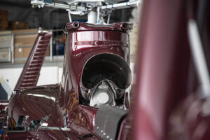 Close up of Maroon Airbus EC130 T2 tailpipe