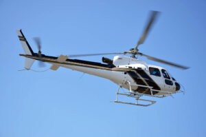 Airbus AS350 B3 Helicopter flying in the sky