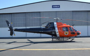 NSW Parks H125 in front of Pacific Crown Helicopters hangar