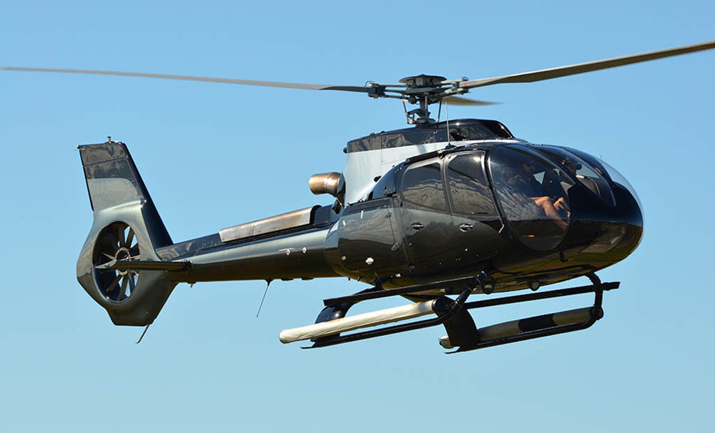 Airbus EC130 T2 flying in the sky