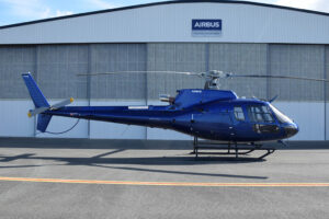 Airbus Helicopters H125 Helicopter in front of Pacific Crown Helicopters hangar