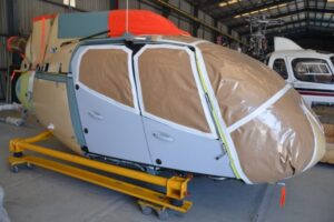 Brand new Airbus H130 Helicopter in hangar