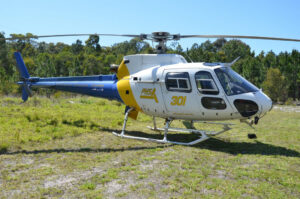 Airbus AS350 BA on a grassfield